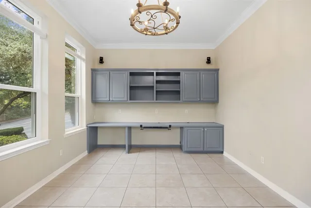 a view of cabinets and window