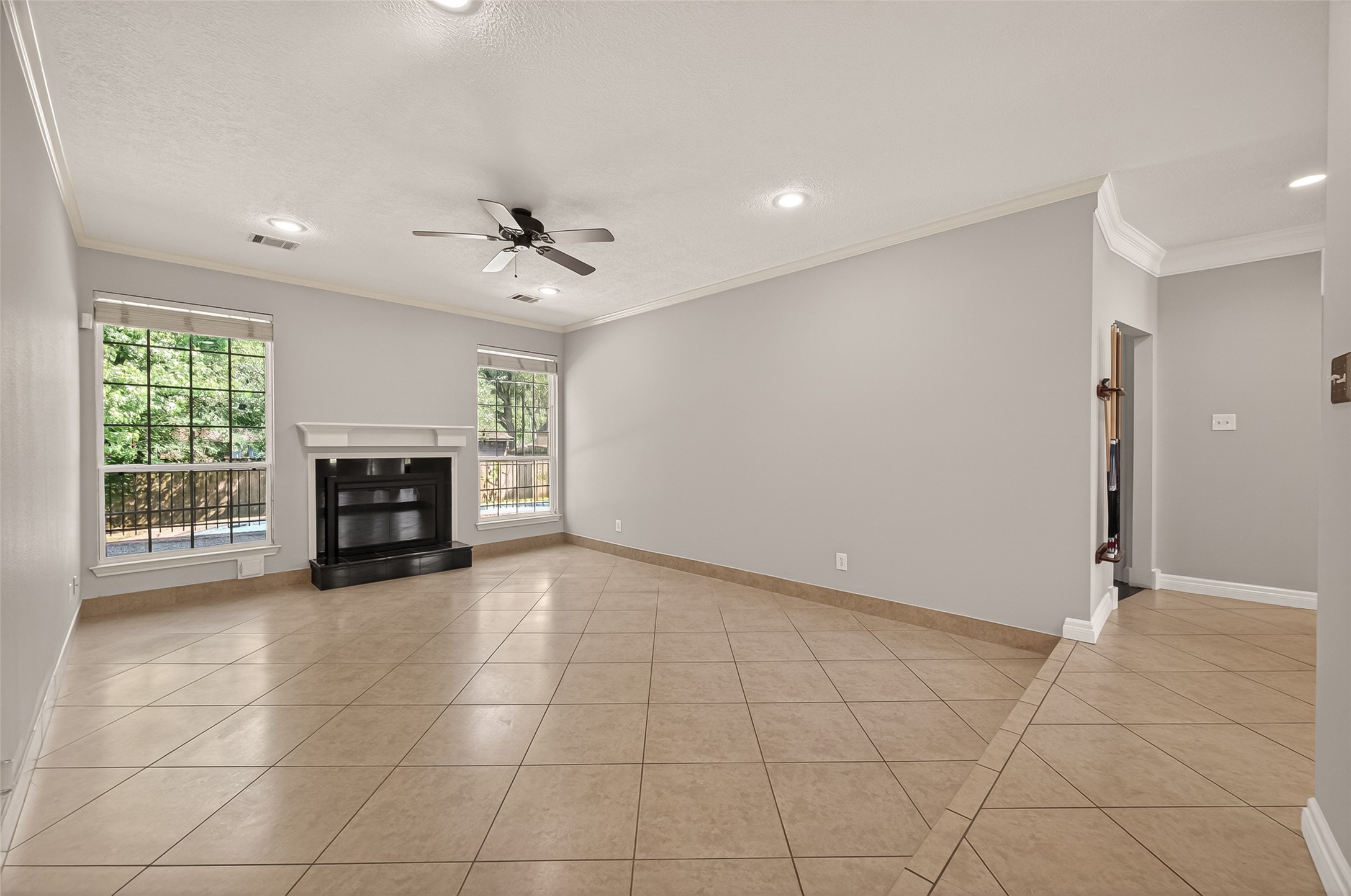 6131 Hampton Way Court Spring, TX 77389 - Photo 13 of 50 a view of an empty room with a fireplace
