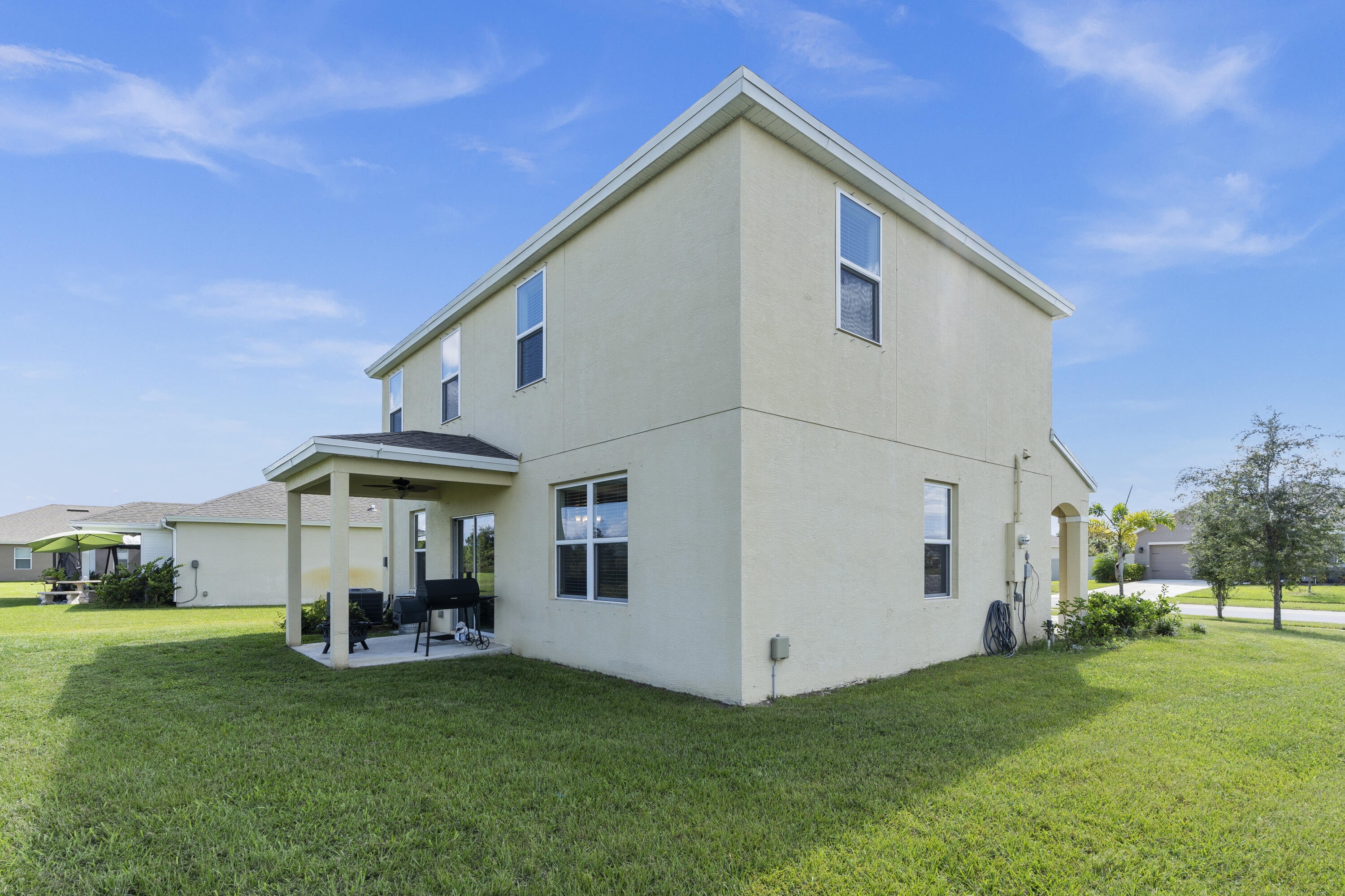 3100 Yellowstone Circle Fort Pierce, FL 34945 - Photo 28 of 28 a front view of a house with garden