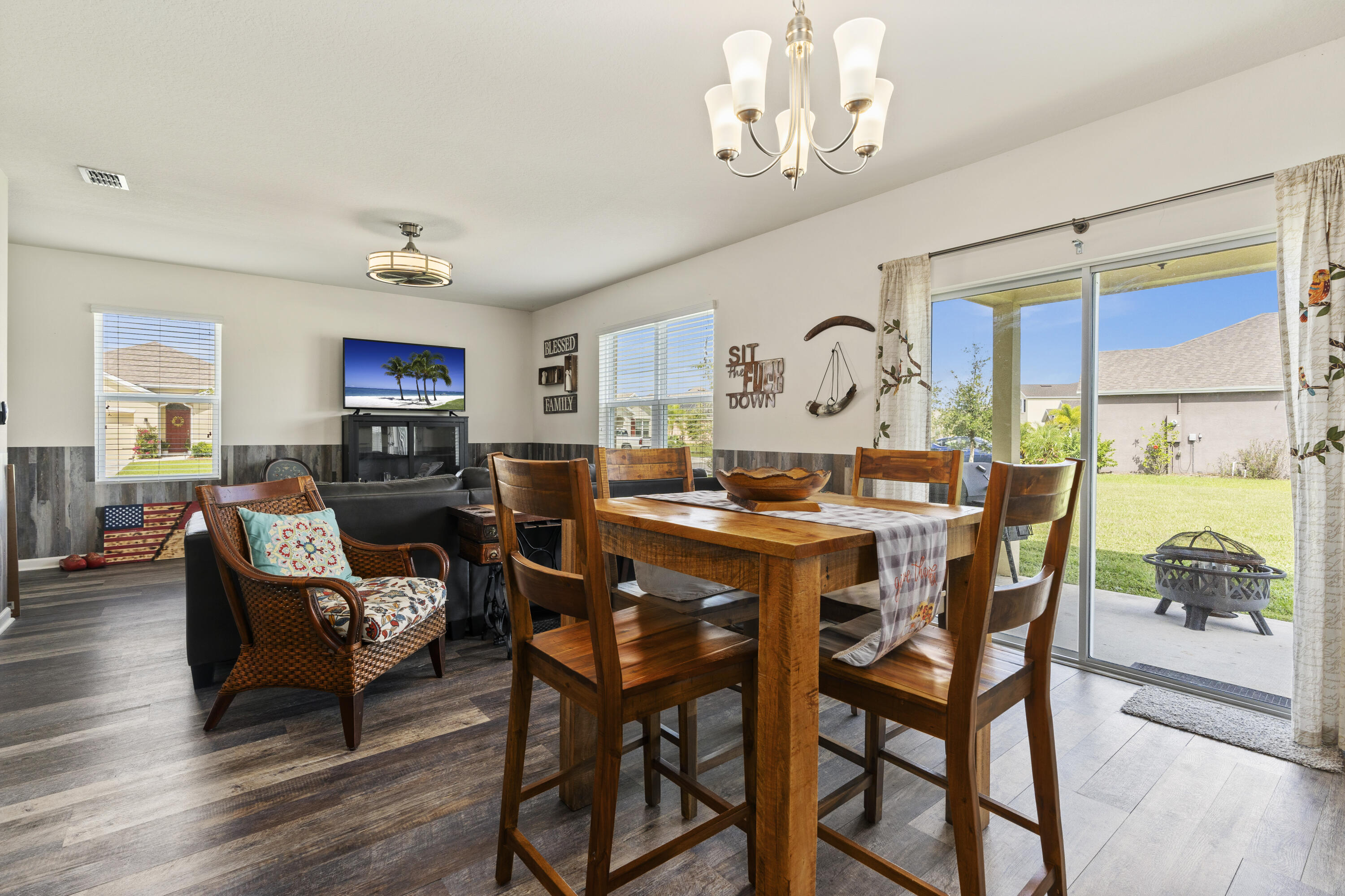 3100 Yellowstone Circle Fort Pierce, FL 34945 - Photo 7 of 28 a view of a dining room with furniture window and wooden floor