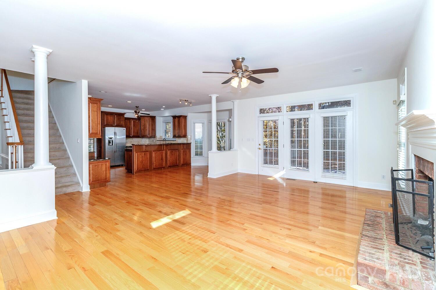 11025 Jordan Rae Lane Charlotte, NC 28277 - Photo 12 of 33 a view of a livingroom with furniture wooden floor and windows