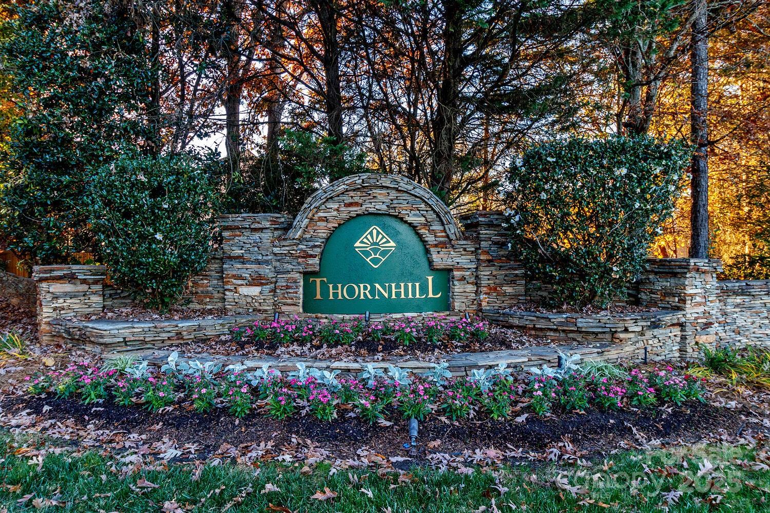 11025 Jordan Rae Lane Charlotte, NC 28277 - Photo 30 of 33 a sign that is sitting in front of flowers