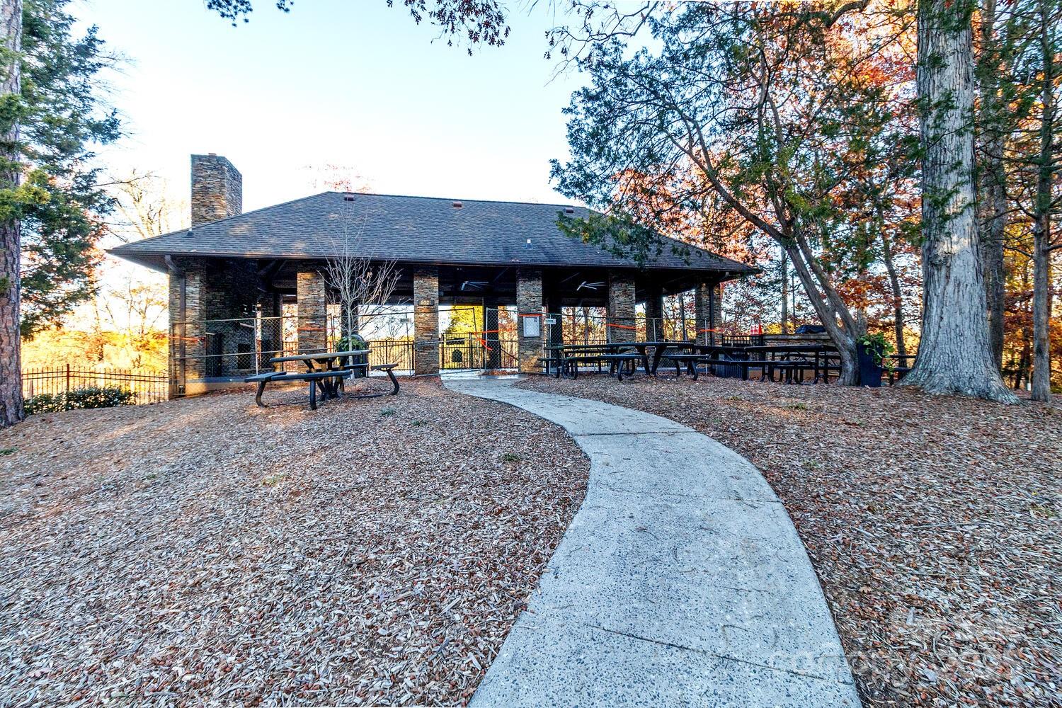 11025 Jordan Rae Lane Charlotte, NC 28277 - Photo 33 of 33 a backyard of a house with barbeque oven table and chairs