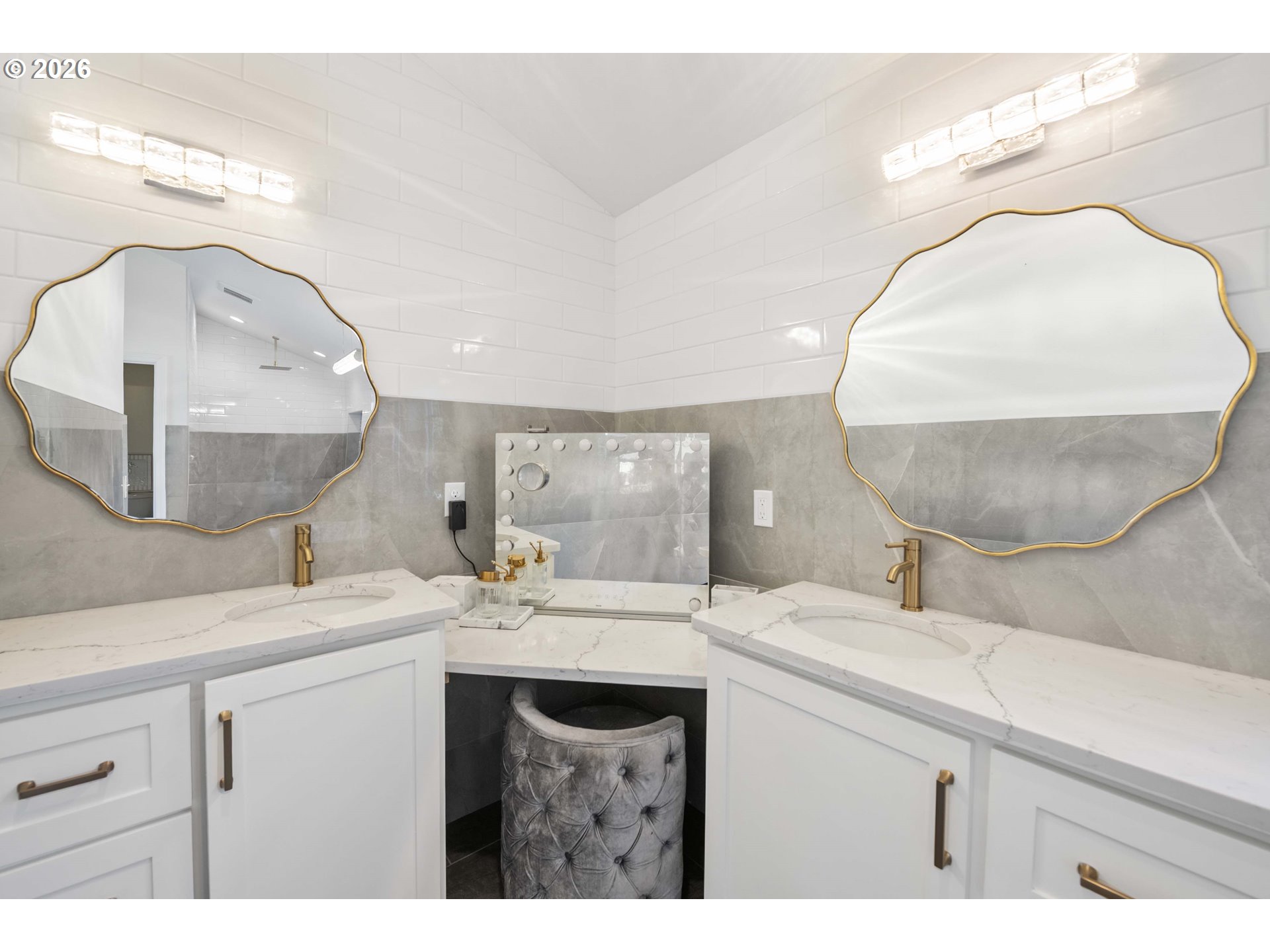3232 Sunset Boulevard Seaside, OR 97138 - Photo 19 of 48 a bathroom with a double vanity sink and a mirror