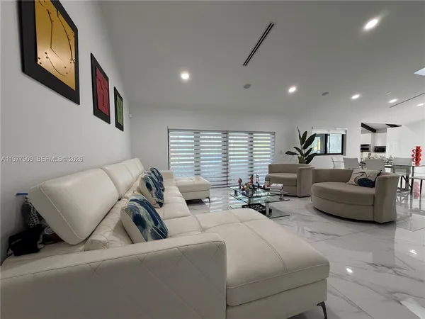 a view of a workspace with furniture