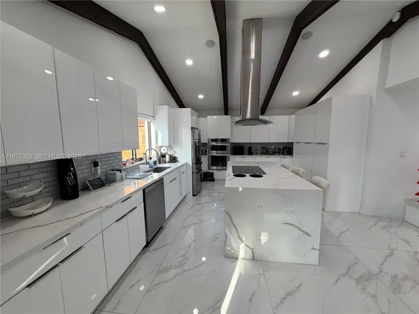 a view of house with yard and entertaining space