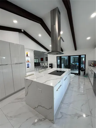 a view of a backyard with sitting area and furniture