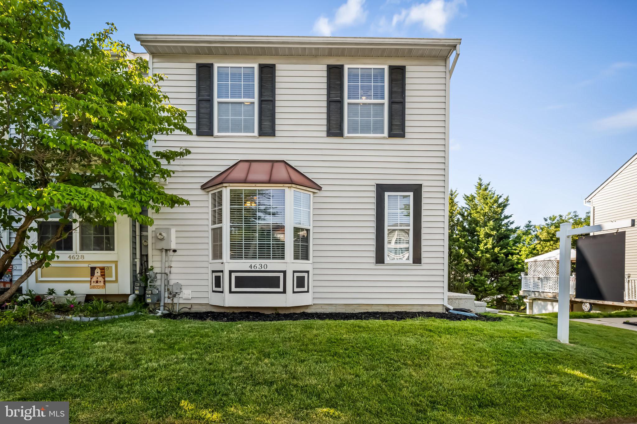 4630 Marksman Court Hampstead, MD 21074 - Photo 1 of 16 front view of a house with a yard