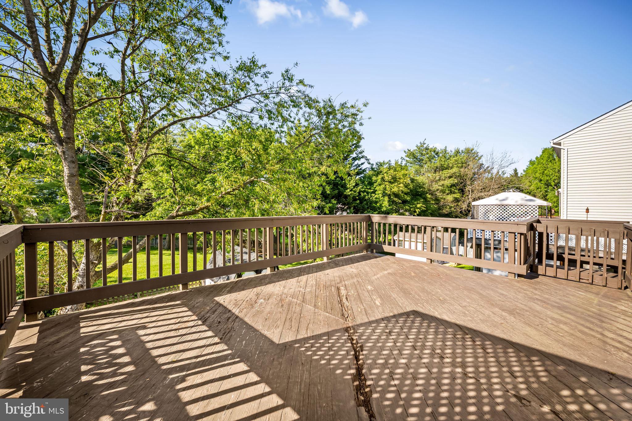 4630 Marksman Court Hampstead, MD 21074 - Photo 16 of 16 a view of a balcony with wooden floor