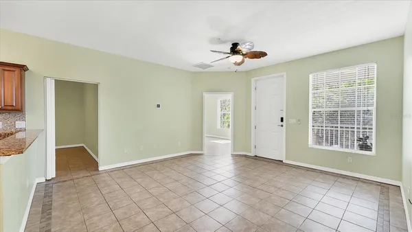 a view of an empty room with a window