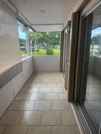 $2,000 | 4 Greenway Village North, Unit 203, Royal Palm Beach, FL 33411