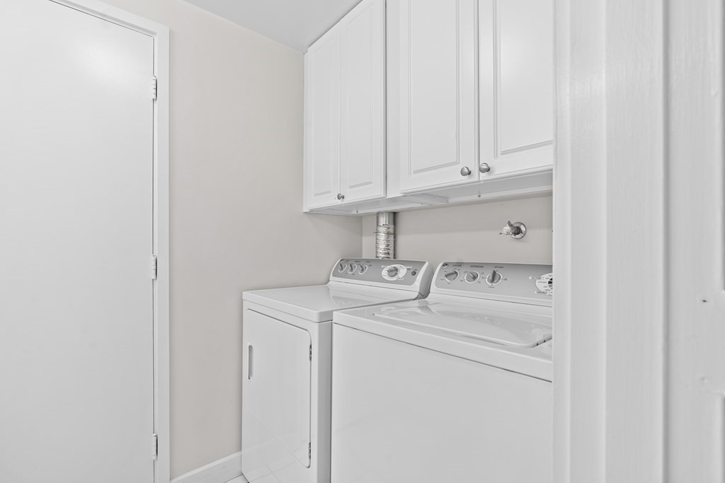 11 Oak Street, Unit 35 Wellesley, MA 02482 - Photo 16 of 22 a utility room with dryer and washer