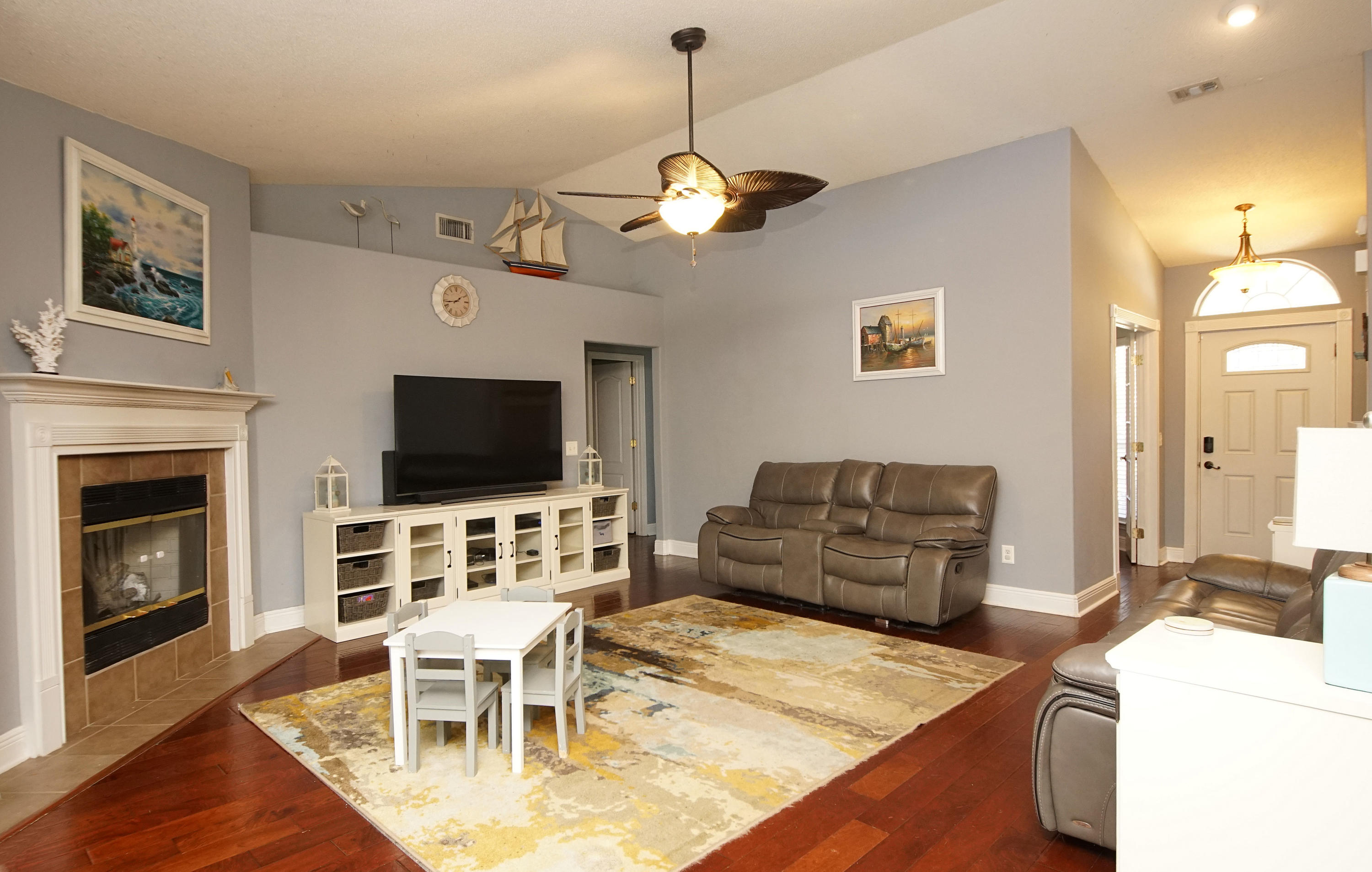532 Vulpes Sanctuary Loop Crestview, FL 32536 - Photo 9 of 31 Family room with gas fire place