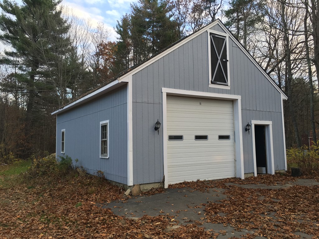 185 Shirley Road Lancaster, MA 01523 - Photo 1 of 15 a view of a house with a yard