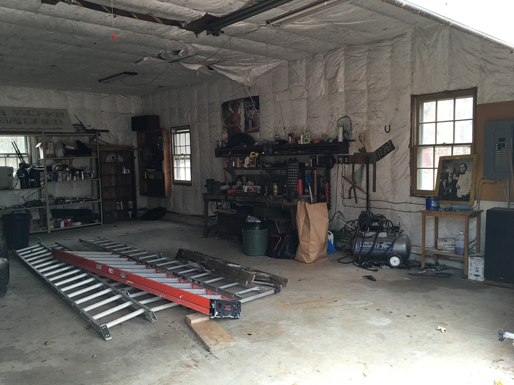 185 Shirley Road Lancaster, MA 01523 - Photo 12 of 15 a room with gym equipment