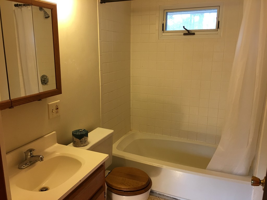 185 Shirley Road Lancaster, MA 01523 - Photo 6 of 15 a bathroom with a sink and a tub