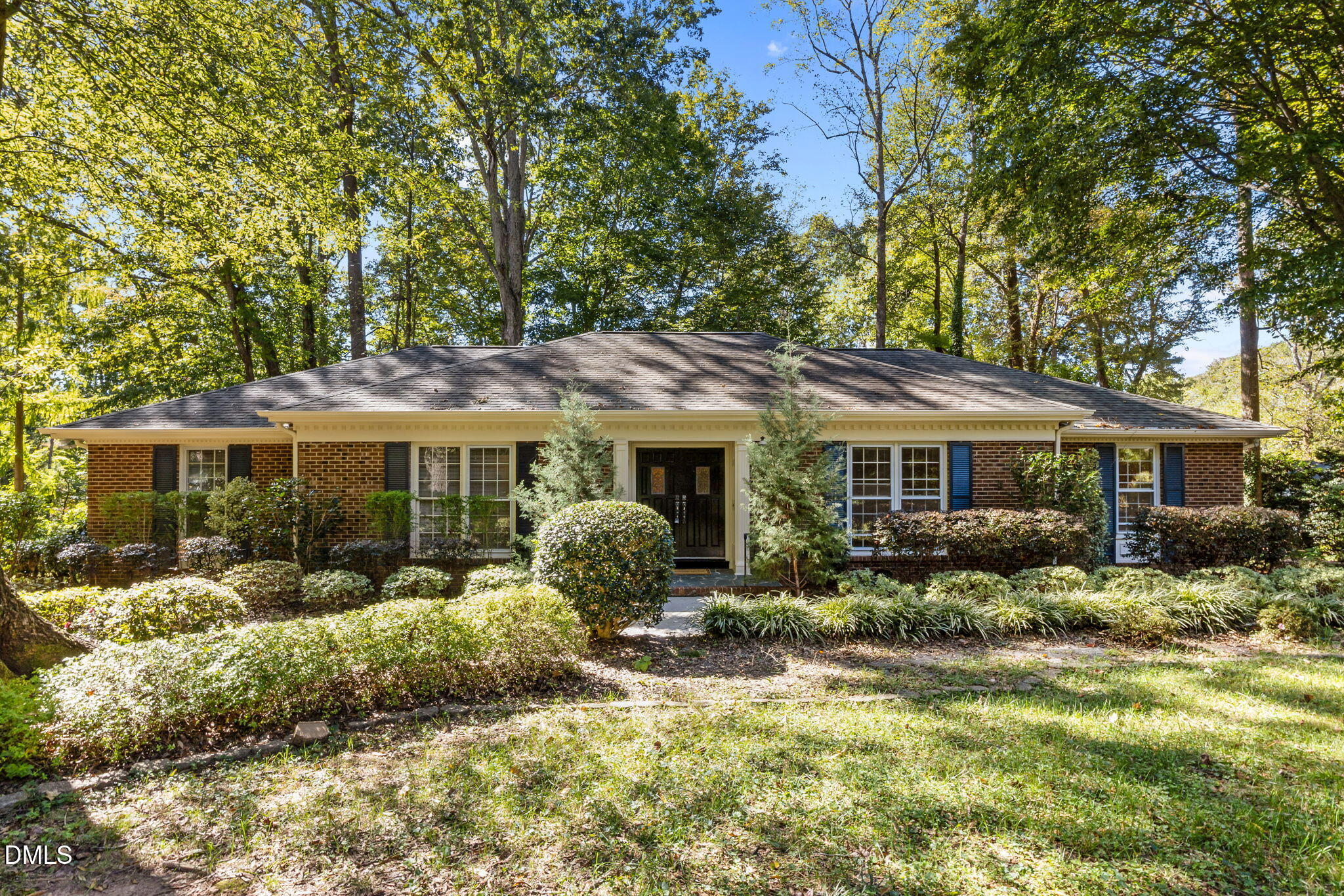 8701 Oneal Road Raleigh, NC 27613 - Photo 1 of 33 a front view of a house with garden
