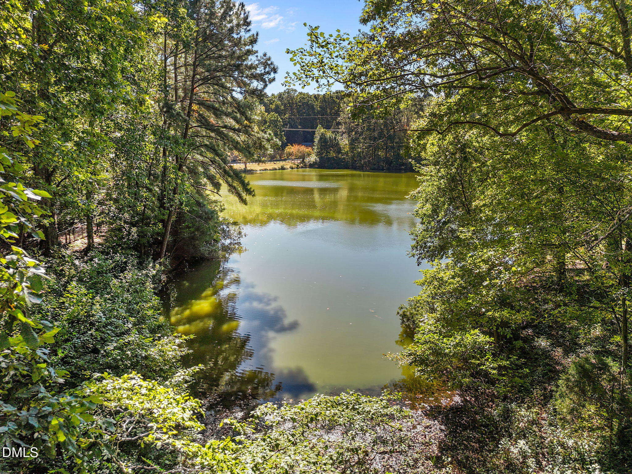 8701 Oneal Road Raleigh, NC 27613 - Photo 14 of 33 a view of a house with a lake view