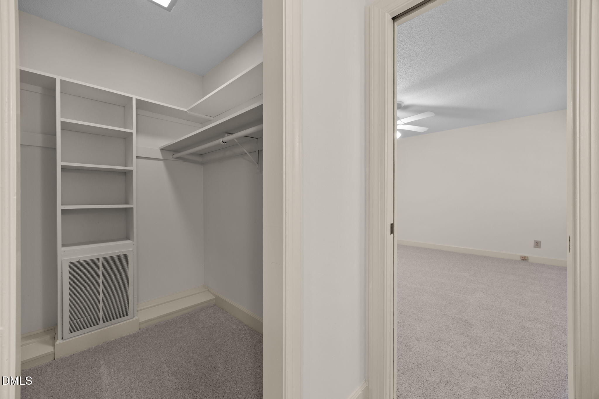 8701 Oneal Road Raleigh, NC 27613 - Photo 18 of 33 a view of an empty walk in closet