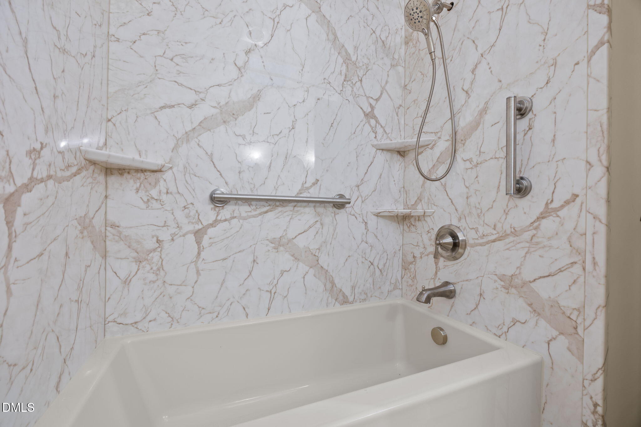 8701 Oneal Road Raleigh, NC 27613 - Photo 21 of 33 a bathroom with a bathtub