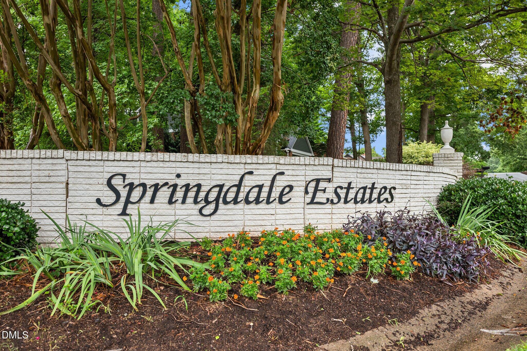 8701 Oneal Road Raleigh, NC 27613 - Photo 30 of 33 a sign broad in front of flowers