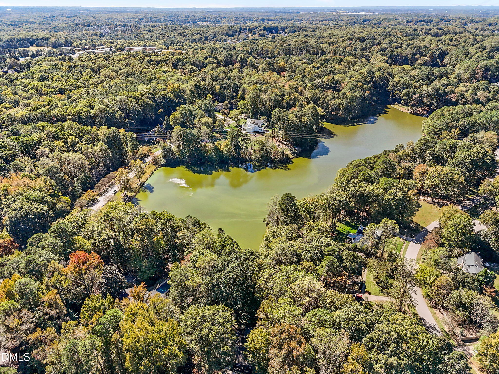 8701 Oneal Road Raleigh, NC 27613 - Photo 32 of 33 an aerial view of residential houses with outdoor space and trees