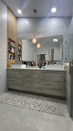 a bathroom with a bathtub and a sink