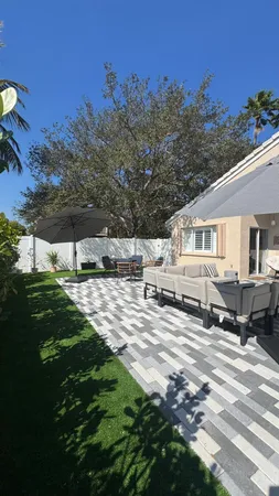 a view of a house with a garden