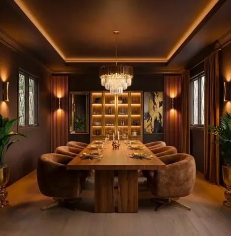 a view of a dining room with furniture and chandelier