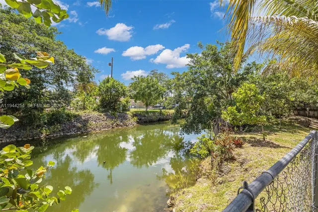 a view of a lake from a balcony