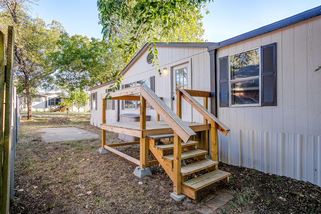317 6th Street Joshua, TX 76058 - Photo 1 of 36 a view of a house with a yard
