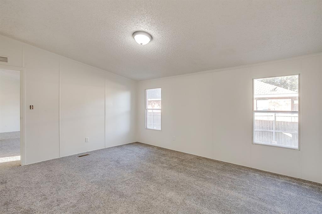 317 6th Street Joshua, TX 76058 - Photo 17 of 36 an empty room with windows