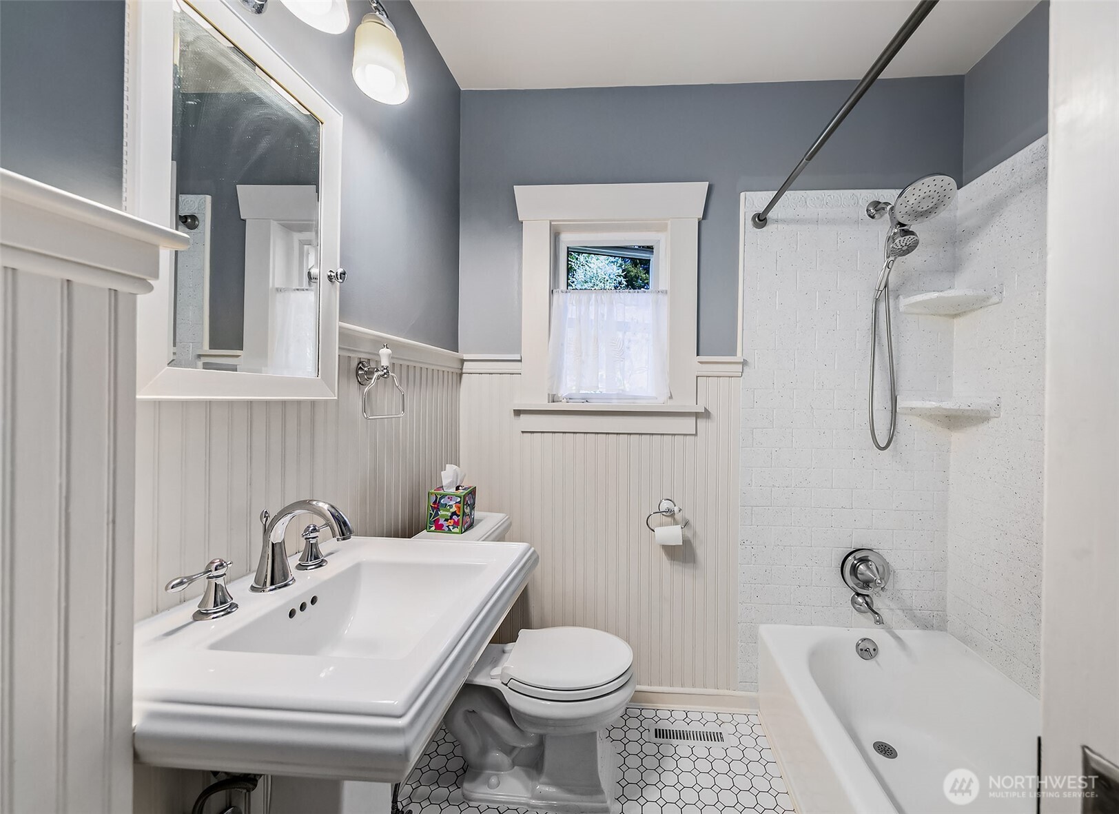 8403 32nd Avenue Southwest Seattle, WA 98126 - Photo 6 of 15 a bathroom with a sink toilet and shower