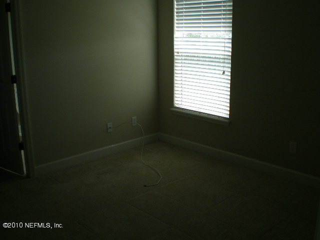 415 Emslie Terrace St. Augustine, FL 32095 - Photo 11 of 13 a view of a small space and a window