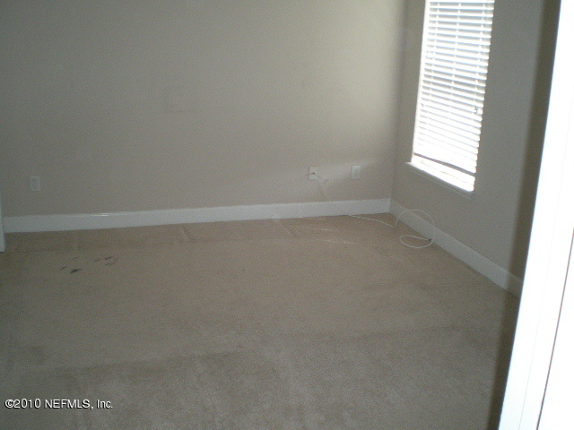 415 Emslie Terrace St. Augustine, FL 32095 - Photo 12 of 13 a view of an empty room with a window