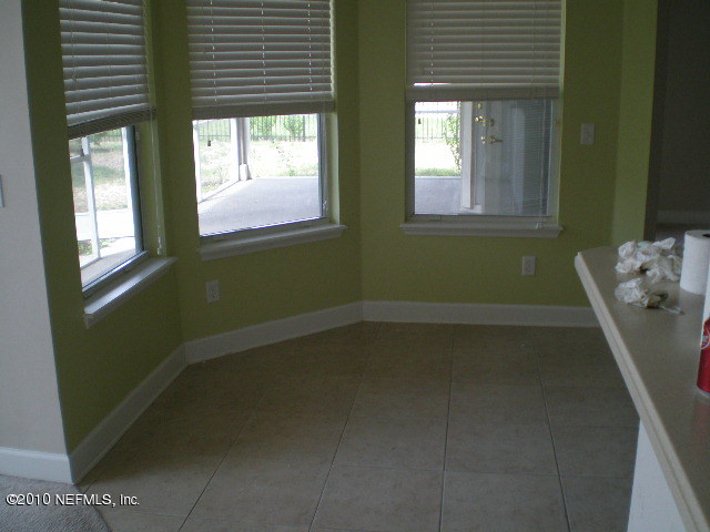 415 Emslie Terrace St. Augustine, FL 32095 - Photo 3 of 13 a room that has a window in it