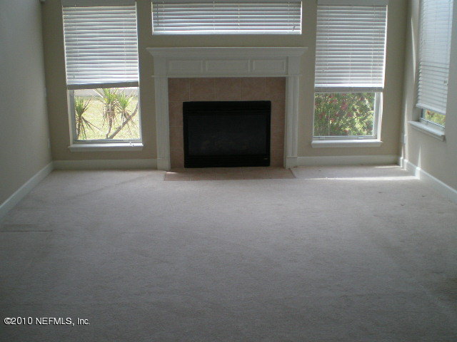 415 Emslie Terrace St. Augustine, FL 32095 - Photo 4 of 13 a view of an empty room with a window