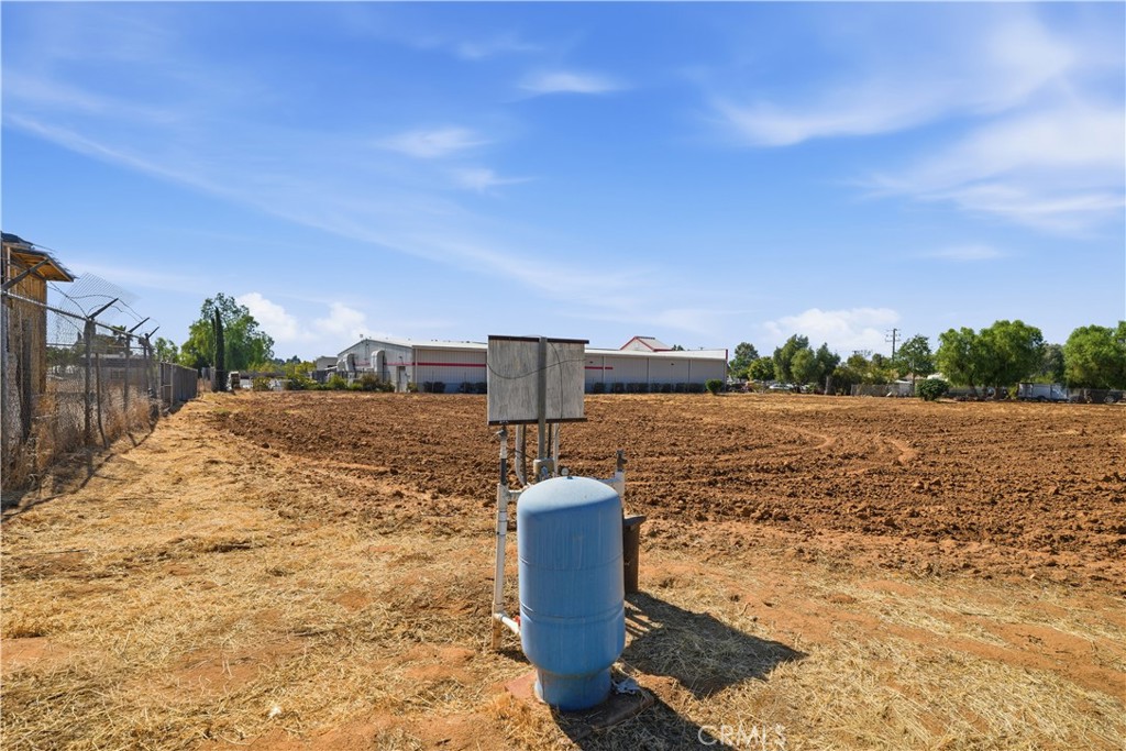 17157 Van Buren Riverside, CA 92504 - Photo 12 of 12 Well in back left corner of the lot