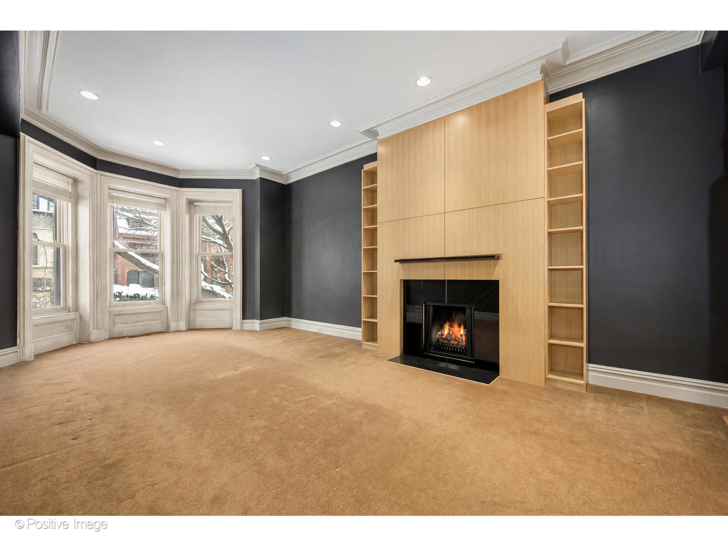 1434 North Dearborn Street Chicago, IL 60610 - Photo 46 of 67 a view of an empty room with a fireplace and a window