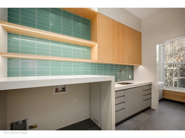 a picture of a bathroom with a shower curtain