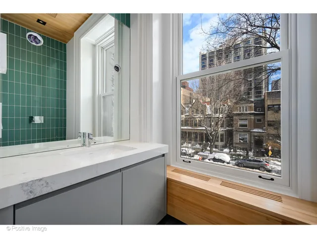 a picture of a bathroom with a shower curtain