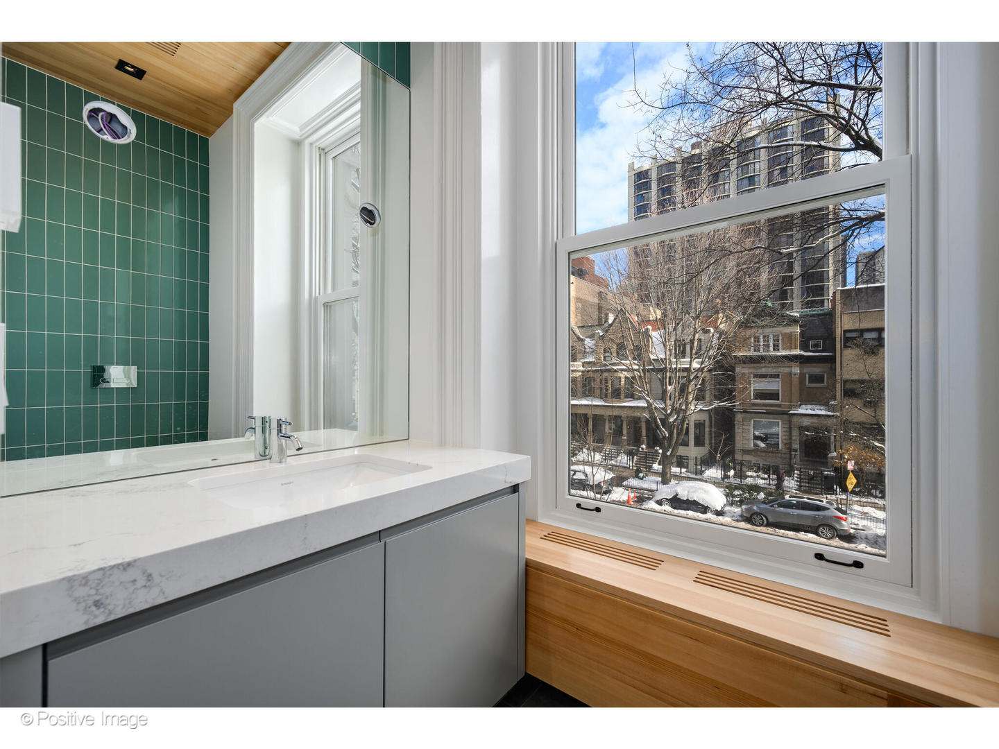 1434 North Dearborn Street Chicago, IL 60610 - Photo 48 of 67 a bathroom with a sink and a mirror