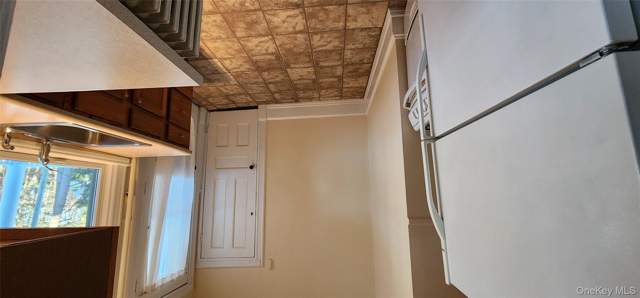 41 Oakland Avenue, Unit # 2 Warwick, NY 10990 - Photo 4 of 9 a bathroom with a sink and a mirror