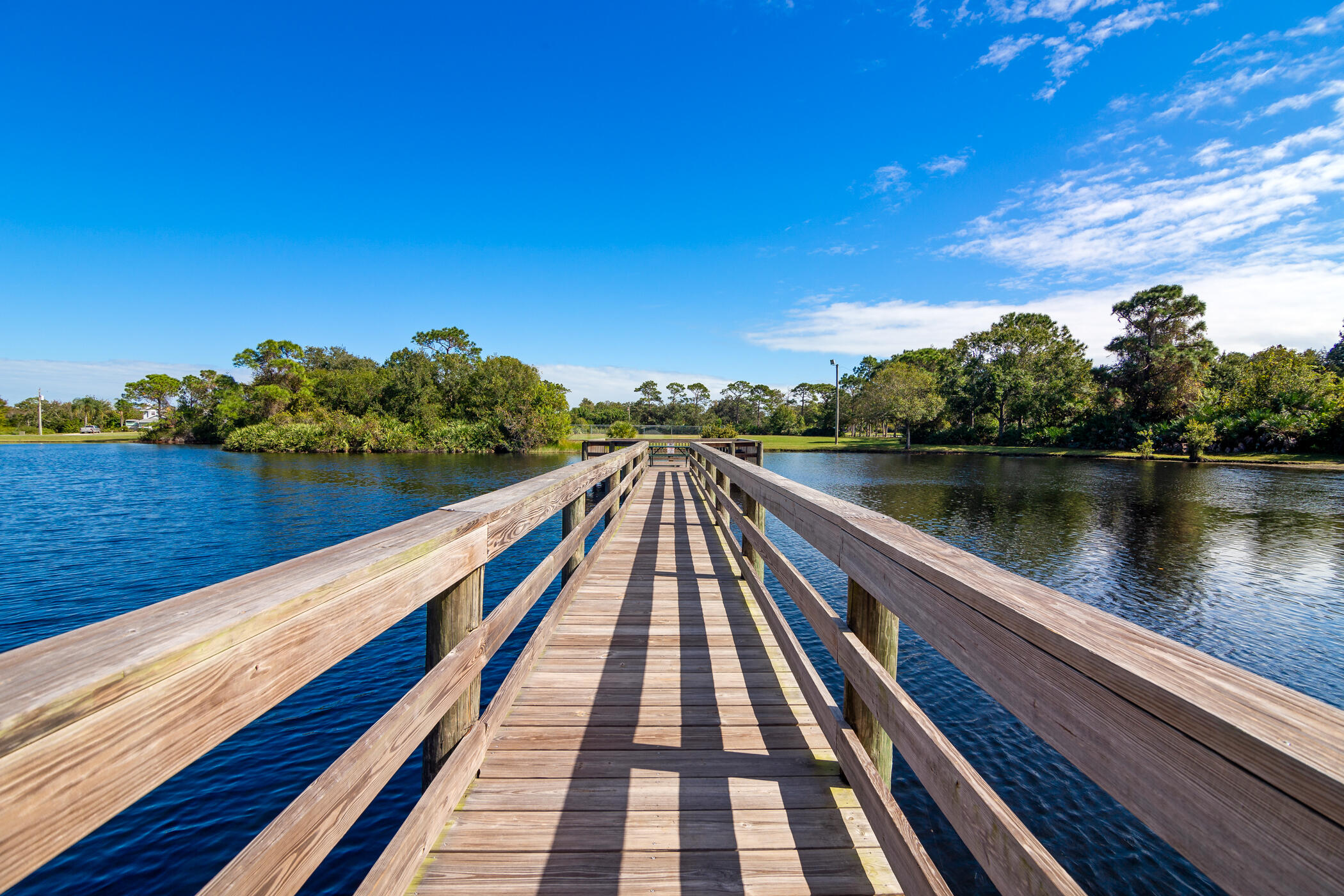 4179 Sparrow Hawk Road Melbourne, FL 32934 - Photo 21 of 26 a view of wooden floor with a lake view