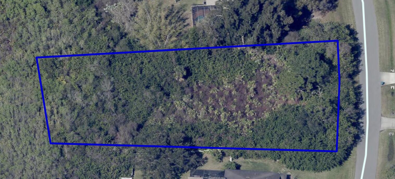 4179 Sparrow Hawk Road Melbourne, FL 32934 - Photo 25 of 26 a street sign on the side of the road