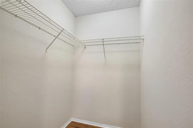 a view of a room with racks on the wall