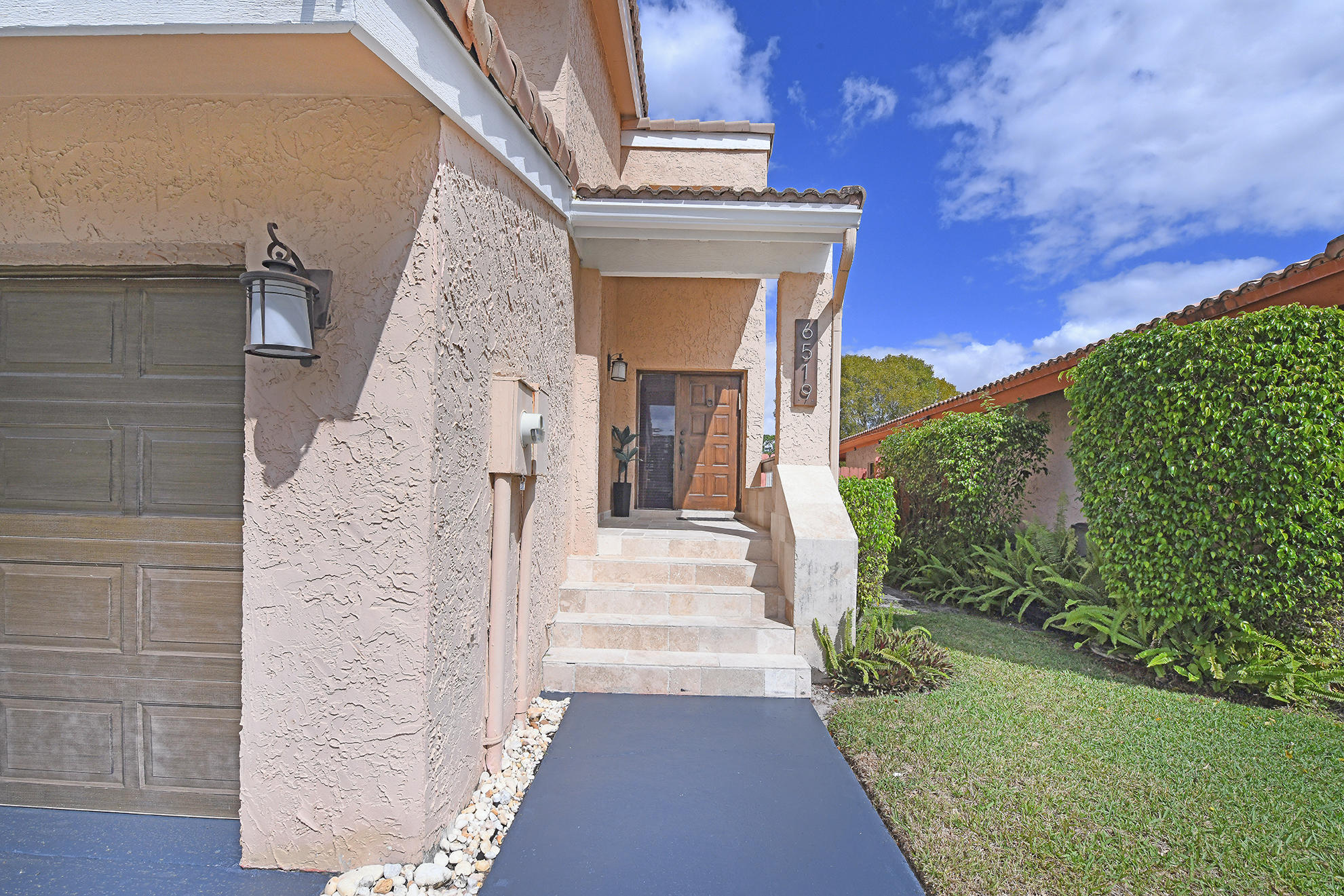 6519 Sweet Maple Lane Boca Raton, FL 33433 - Photo 3 of 29 11. the front door