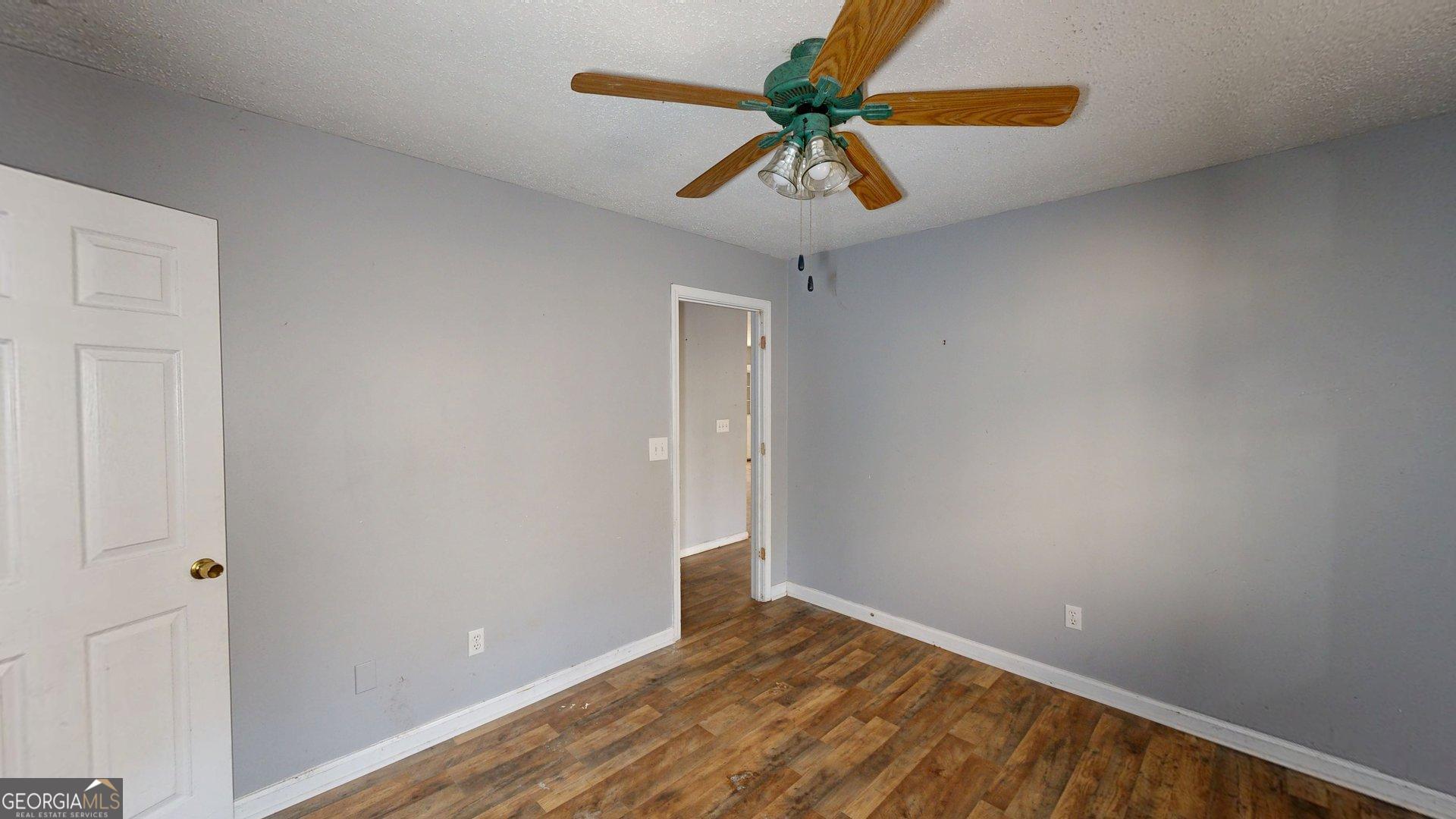 1225 Coppermine Road Buchanan, GA 30113 - Photo 19 of 29 a view of an empty room with a window