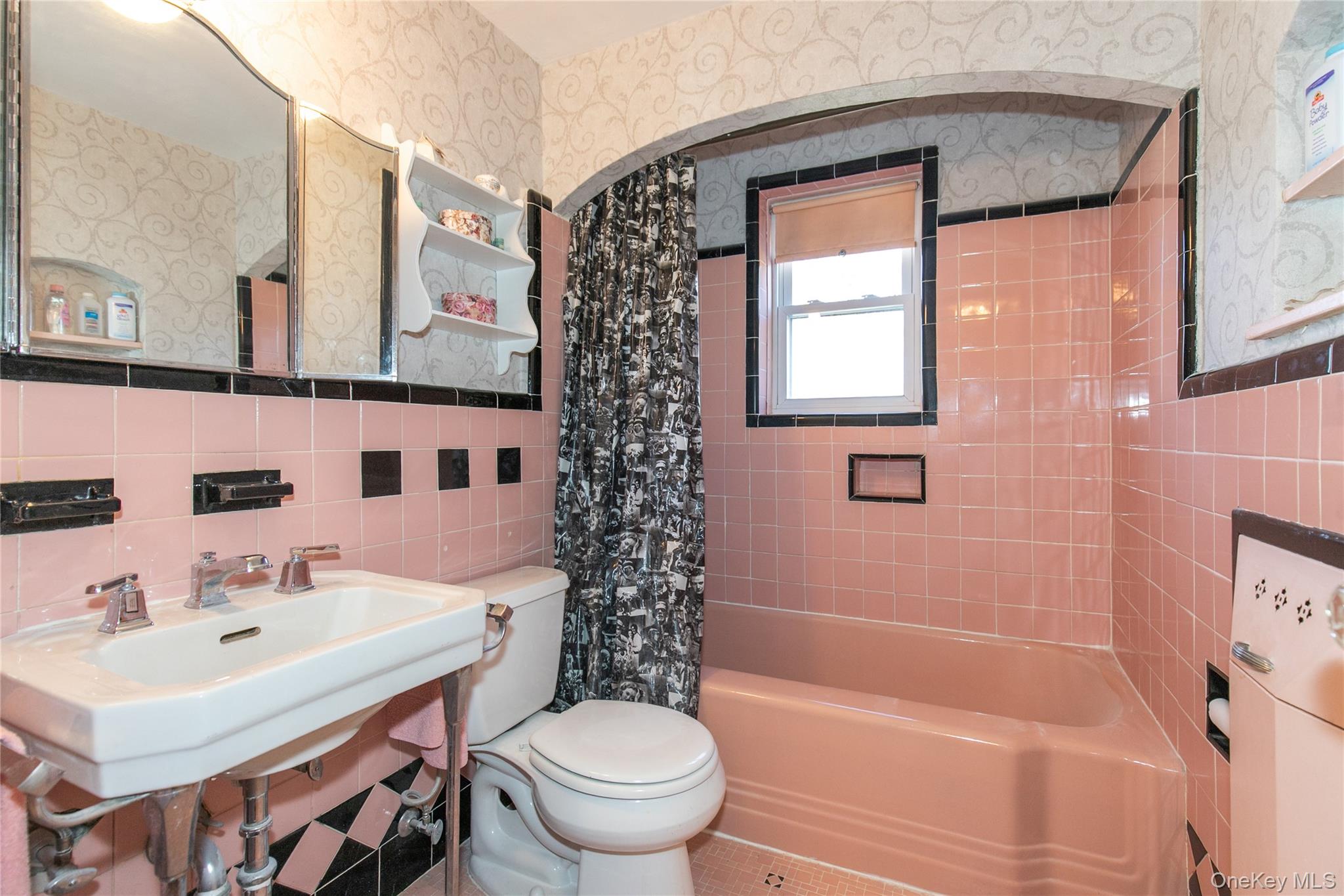 8 Plymouth Road Great Neck, NY 11023 - Photo 17 of 25 a bathroom with a sink toilet and shower
