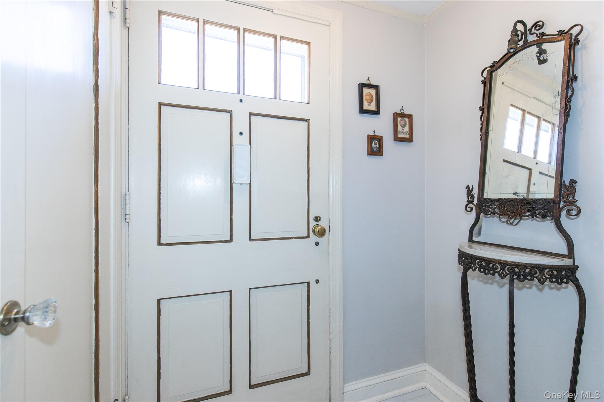 8 Plymouth Road Great Neck, NY 11023 - Photo 2 of 25 a view of a door and an entryway in a house